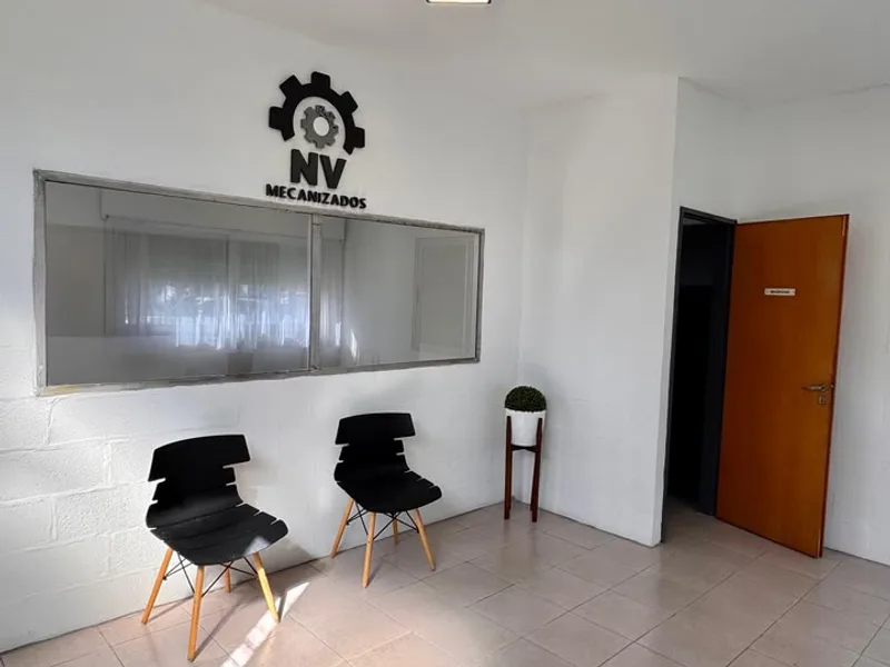 Recepción de Mecanizados NV, con el mostrador de atención al ingresar